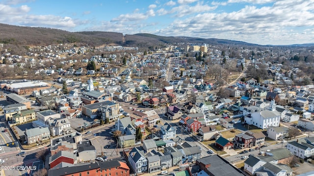 aerial view featuring a mountain view and a residential view