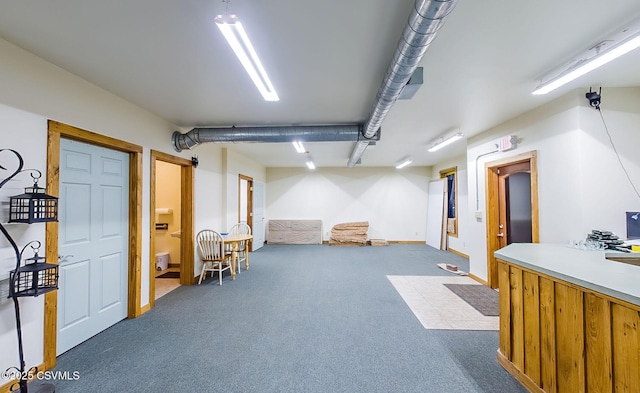 finished basement with carpet flooring