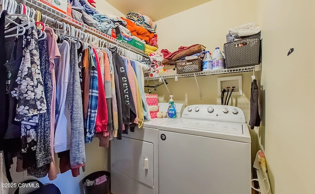 laundry area featuring laundry area and washing machine and clothes dryer