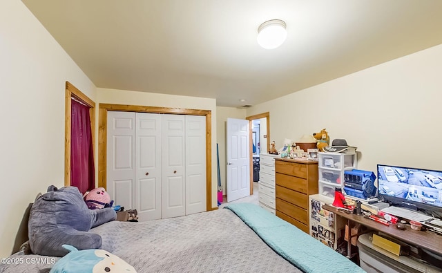 carpeted bedroom featuring a closet