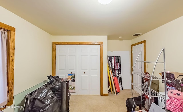 interior space with visible vents and carpet floors