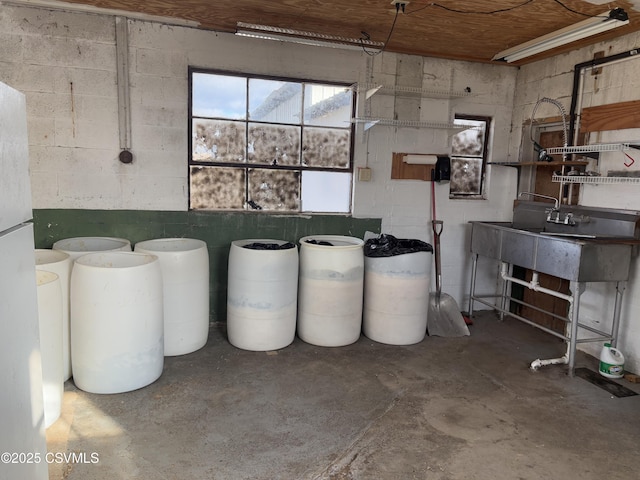 miscellaneous room with concrete flooring