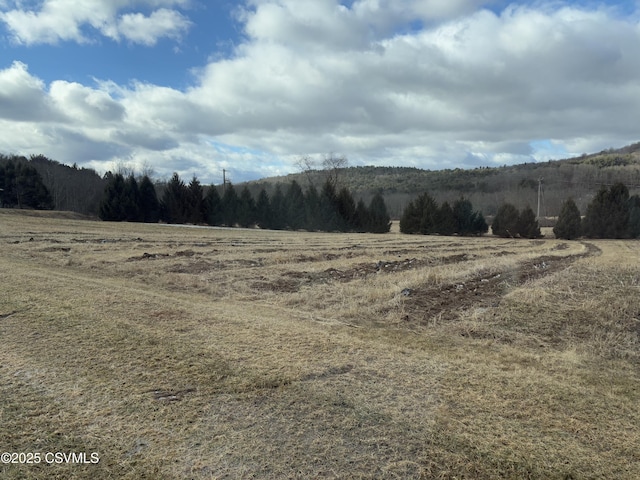 view of mountain feature featuring a rural view