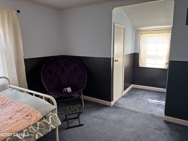 bedroom featuring baseboards, carpet, and crown molding