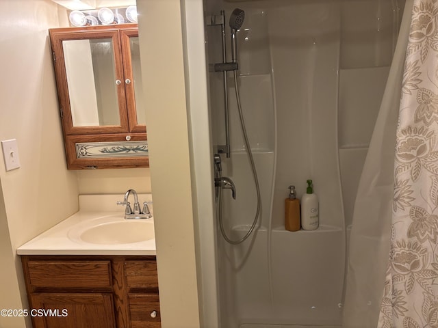 full bathroom featuring vanity and a shower with shower curtain