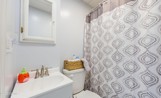 full bathroom with vanity, toilet, and a shower with curtain