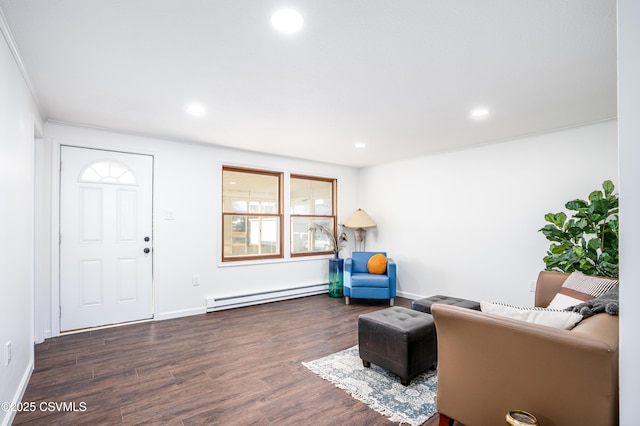 interior space featuring recessed lighting, wood finished floors, baseboards, and baseboard heating