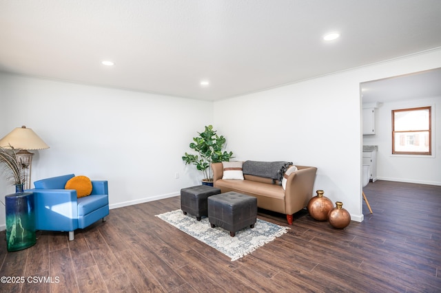 living area with recessed lighting, baseboards, and wood finished floors