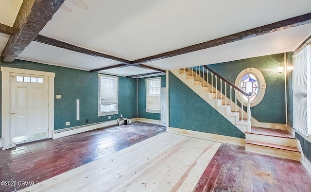 575 Crestwood Dr, Bloomsburg, PA 17815 - interior space featuring beam ceiling, stairs, a baseboard heating unit, and wood-type flooring