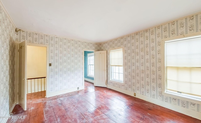 575 Crestwood Dr, Bloomsburg, PA 17815 - empty room with wallpapered walls, baseboards, and wood-type flooring