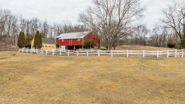 575 Crestwood Dr, Bloomsburg, PA 17815 - view of yard featuring fence, a barn, an outdoor structure, and a rural view