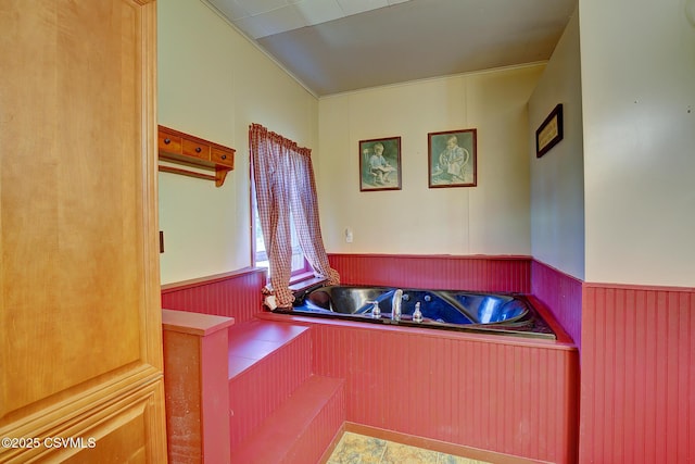 bathroom featuring a wainscoted wall