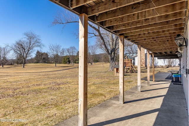 view of patio with a playground