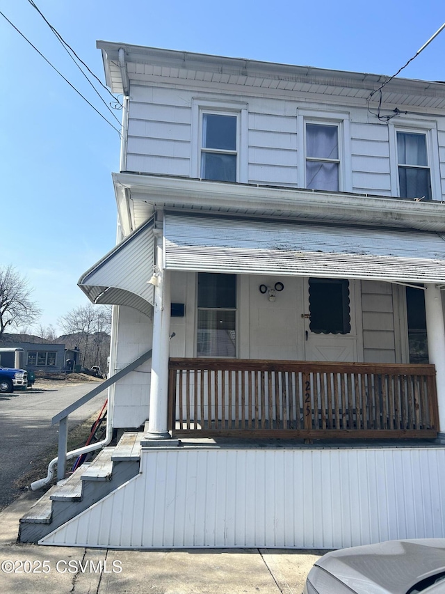 view of property with a porch