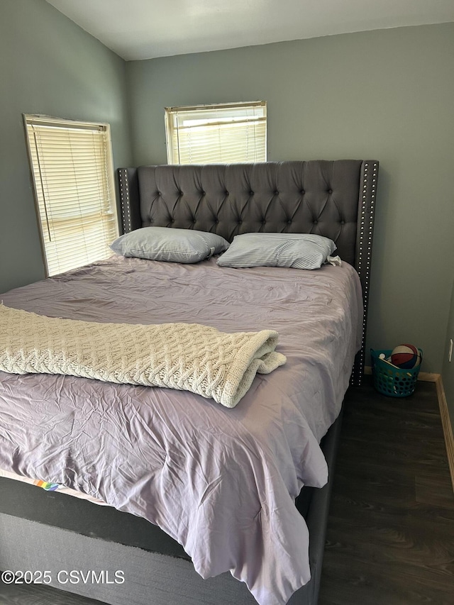 bedroom featuring wood finished floors