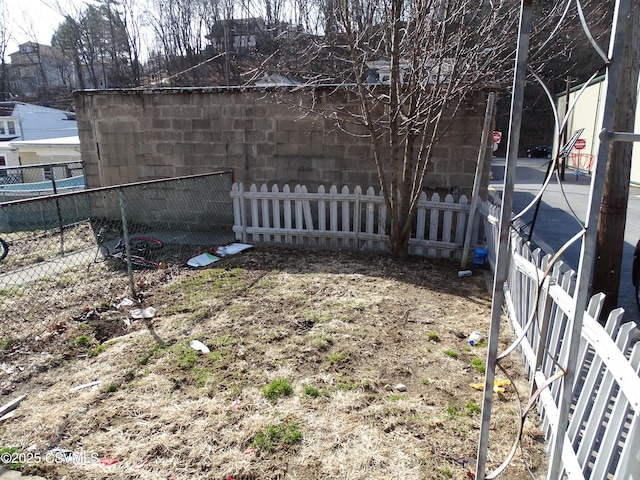 view of yard with fence