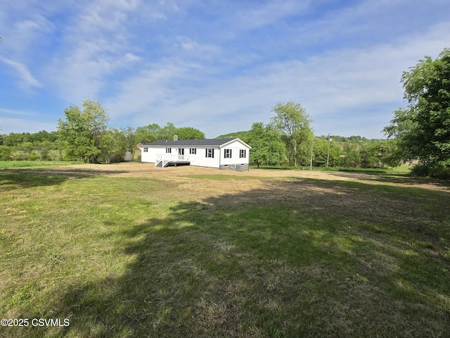 36 Starner Rd, Danville, PA 17821 - view of green lawn with a wooden deck