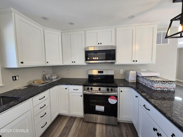 36 Starner Rd, Danville, PA 17821 - kitchen featuring stainless steel appliances, white cabinets, and dark wood-style floors