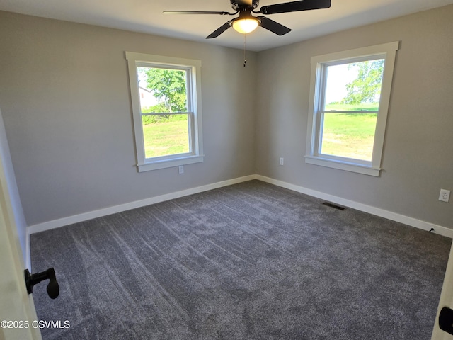 36 Starner Rd, Danville, PA 17821 - empty room featuring ceiling fan, dark colored carpet, and baseboards