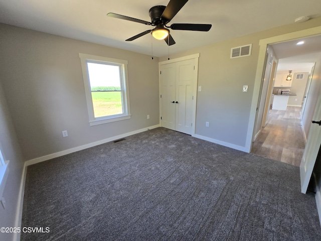 36 Starner Rd, Danville, PA 17821 - unfurnished bedroom featuring carpet, baseboards, a closet, and a ceiling fan
