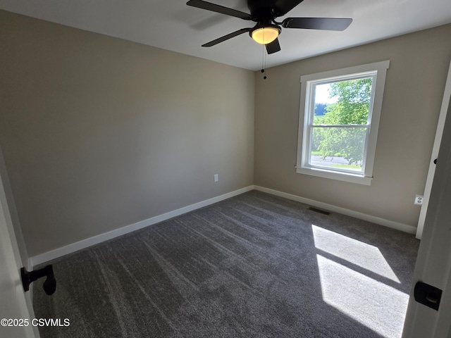 36 Starner Rd, Danville, PA 17821 - spare room with baseboards, ceiling fan, and dark carpet
