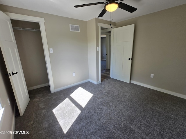 36 Starner Rd, Danville, PA 17821 - unfurnished bedroom with dark colored carpet, baseboards, ceiling fan, and a closet
