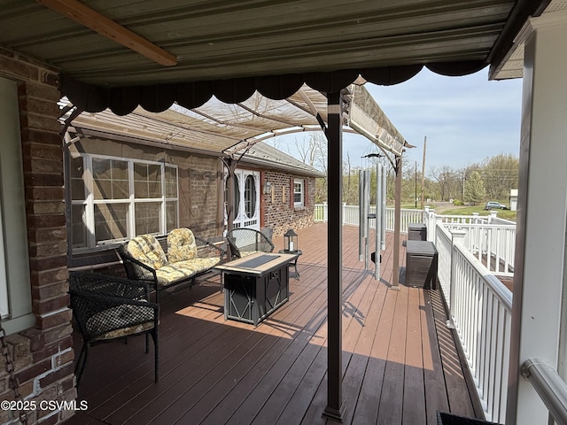 deck with an outdoor fire pit