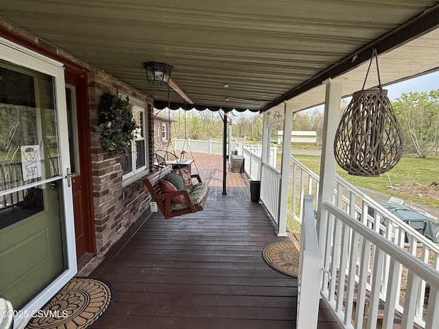 deck featuring a porch