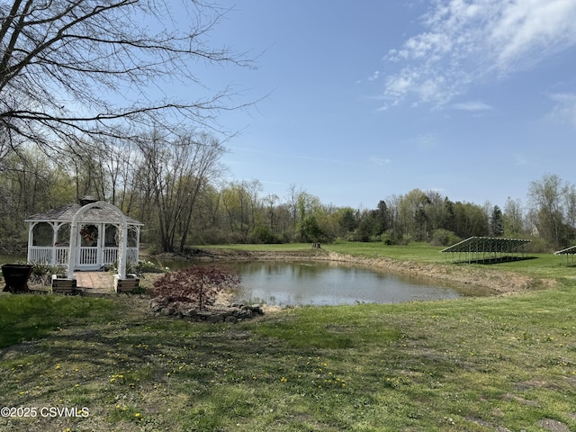 property view of water with a gazebo