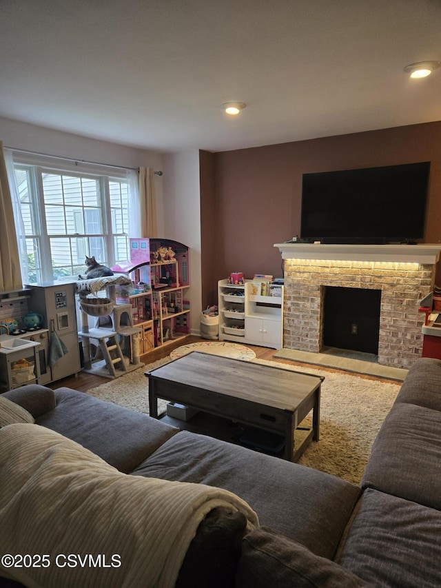 495 Meadow Ln, Danville, PA 17821 - living room with a brick fireplace and recessed lighting