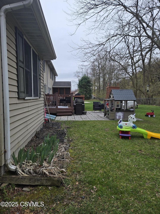 495 Meadow Ln, Danville, PA 17821 - view of grassy yard with a deck, a patio area, and an outbuilding