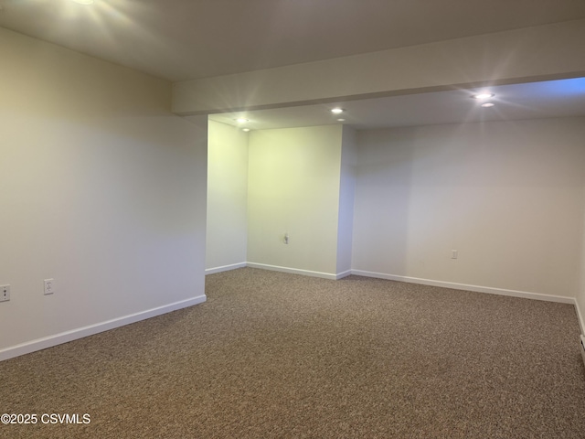 finished below grade area with recessed lighting, carpet flooring, and baseboards