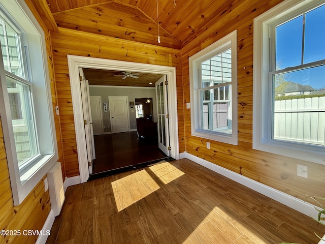 unfurnished sunroom featuring a healthy amount of sunlight