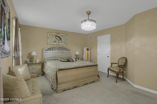 bedroom featuring light carpet, visible vents, baseboards, and a chandelier