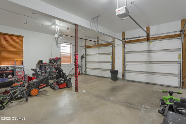 garage featuring a garage door opener
