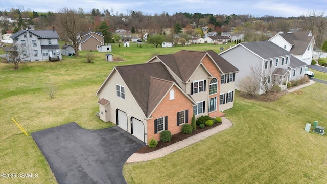 drone / aerial view featuring a residential view