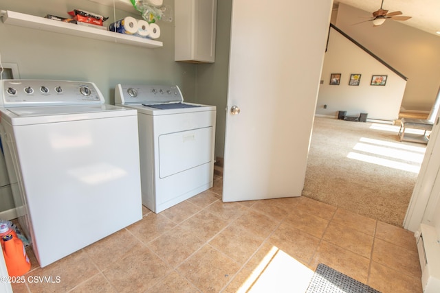 washroom with ceiling fan, laundry area, washing machine and dryer, a baseboard heating unit, and light carpet