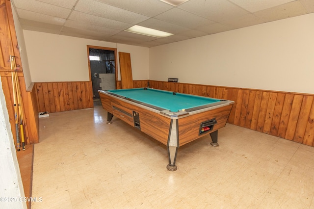 recreation room featuring billiards, a wainscoted wall, a paneled ceiling, and light floors