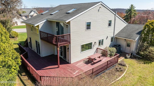 87 Lindsey Ave, Danville, PA 17821 - rear view of property featuring a yard, a wooden deck, and roof with shingles