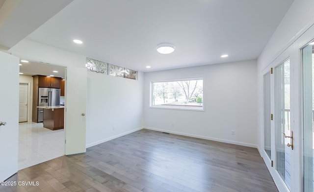 87 Lindsey Ave, Danville, PA 17821 - empty room featuring light wood-type flooring, baseboards, and recessed lighting