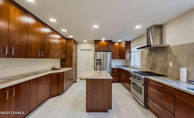 87 Lindsey Ave, Danville, PA 17821 - kitchen with recessed lighting, a center island, light stone countertops, wall chimney exhaust hood, and stainless steel appliances