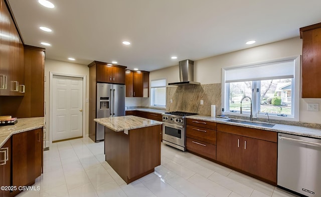 87 Lindsey Ave, Danville, PA 17821 - kitchen with wall chimney exhaust hood, a kitchen island, light stone counters, a sink, and high quality appliances