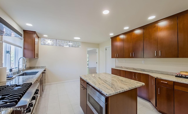 87 Lindsey Ave, Danville, PA 17821 - kitchen with stainless steel microwave, recessed lighting, light stone countertops, and a sink