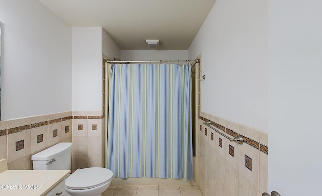 87 Lindsey Ave, Danville, PA 17821 - bathroom featuring wainscoting, tile patterned flooring, and tile walls