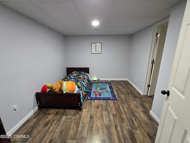 444 Frederick Dr, Watsontown, PA 17777 - bedroom with baseboards, a drop ceiling, and wood finished floors