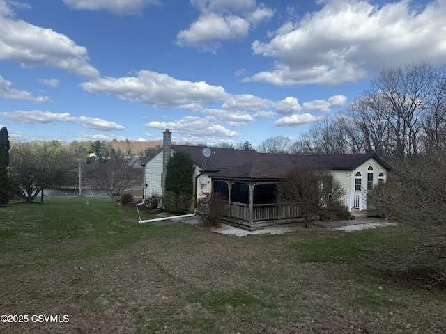 73 Seneca Dr, Shickshinny, PA 18655 - rear view of property with a lawn, a shingled roof, and a deck