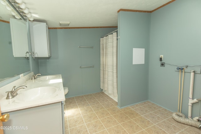 full bath featuring crown molding, a sink, double vanity, and a shower with curtain
