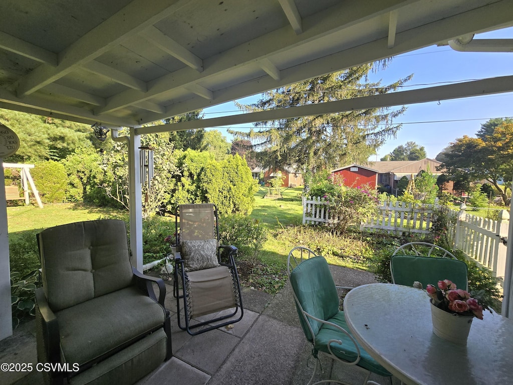 view of patio / terrace with fence