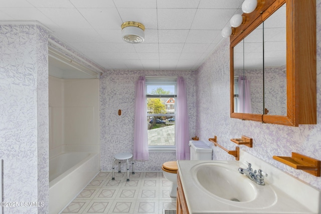 1205 N River Ave, Sunbury, PA 17801 - full bath with wallpapered walls, toilet, tile patterned floors, and vanity