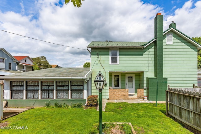 1205 N River Ave, Sunbury, PA 17801 - back of property with a chimney and metal roof